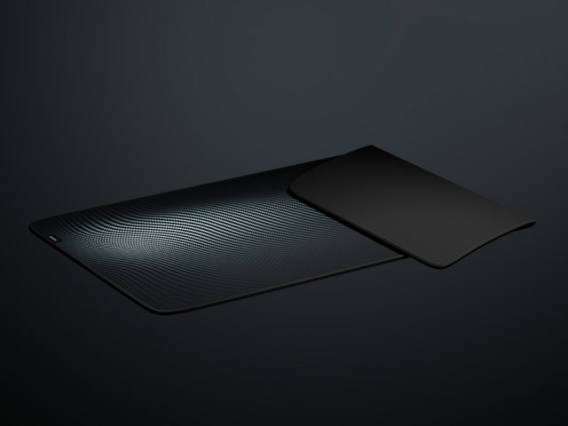 Black gaming mouse pad with a textured design, measuring 1100x450mm, featuring a sleek, modern appearance
