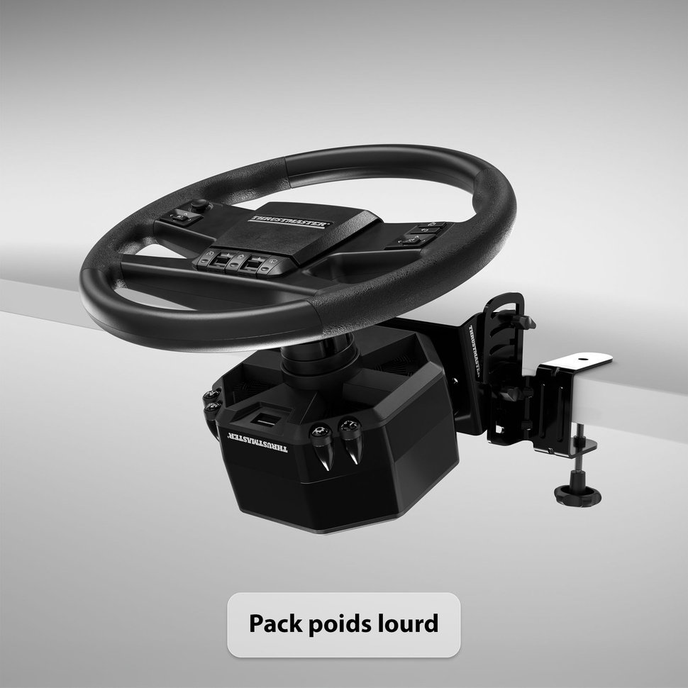 Le texte indique « Pack poids lourd ». Volant noir avec poignée haut de gamme et capuchon central chromé, monté sur une pince de base réglable pour véhicule ou configuration de jeu.