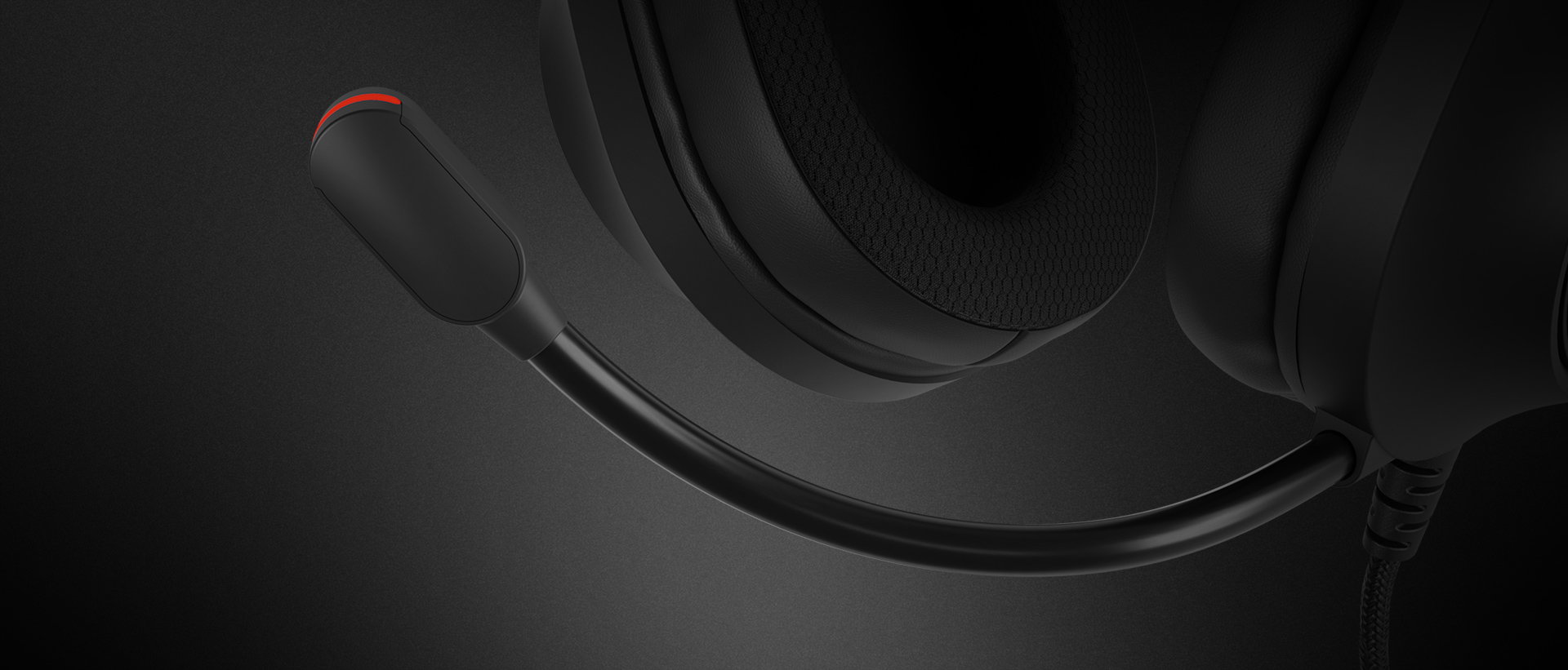 Headphones with a flexible microphone and black finish, featuring glowing accents