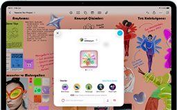 iYatay pozisyonda duran iPad Air’in önden dış görünümü, ses yükseltme düğmesi, ses azaltma düğmesi, güç düğmesi, ekranda çeşitli simgelerle renkli bir uygulama arayüzü gösteriliyor