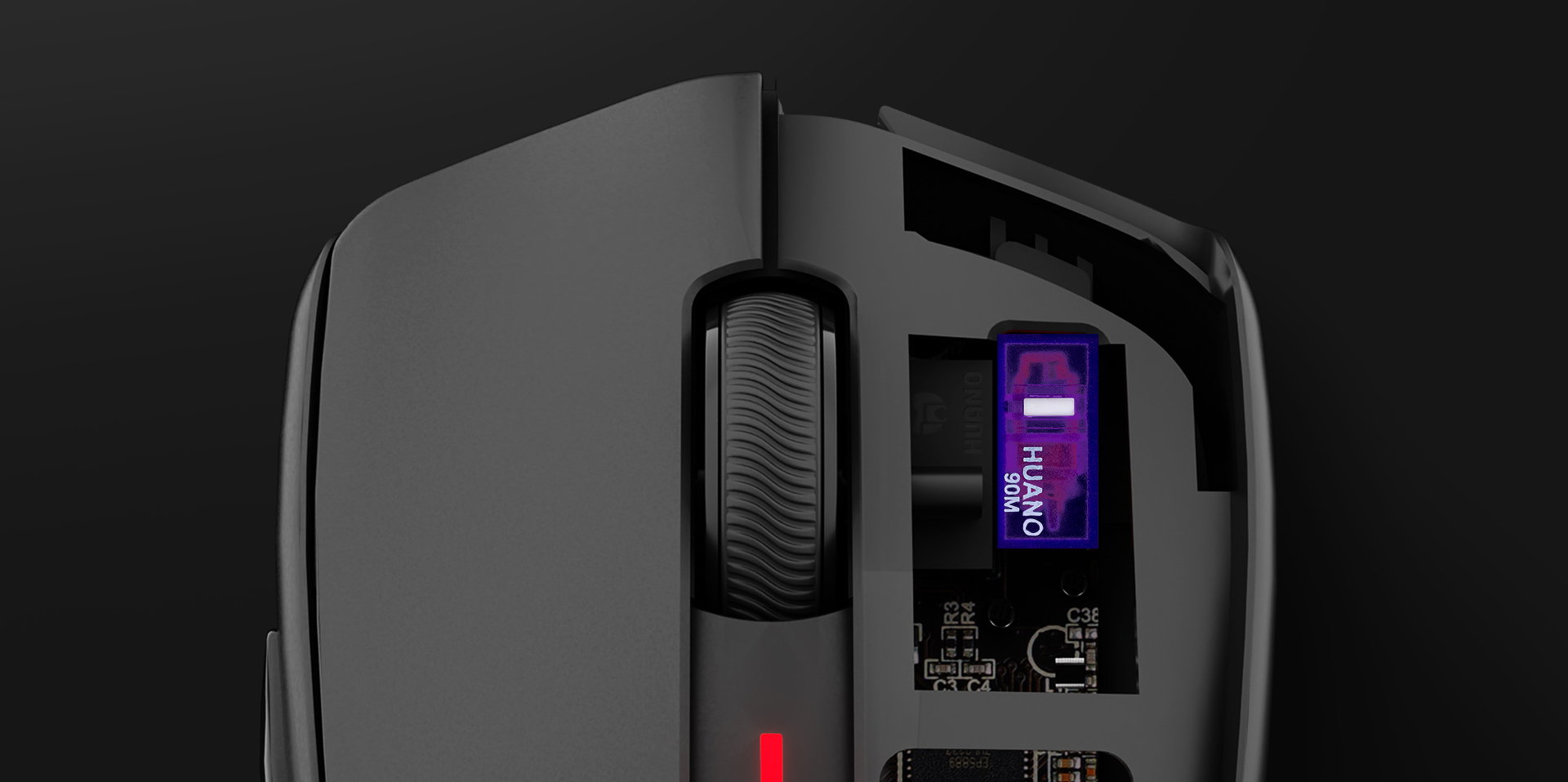 Close-up view of a computer mouse showing internal components and connection port.
